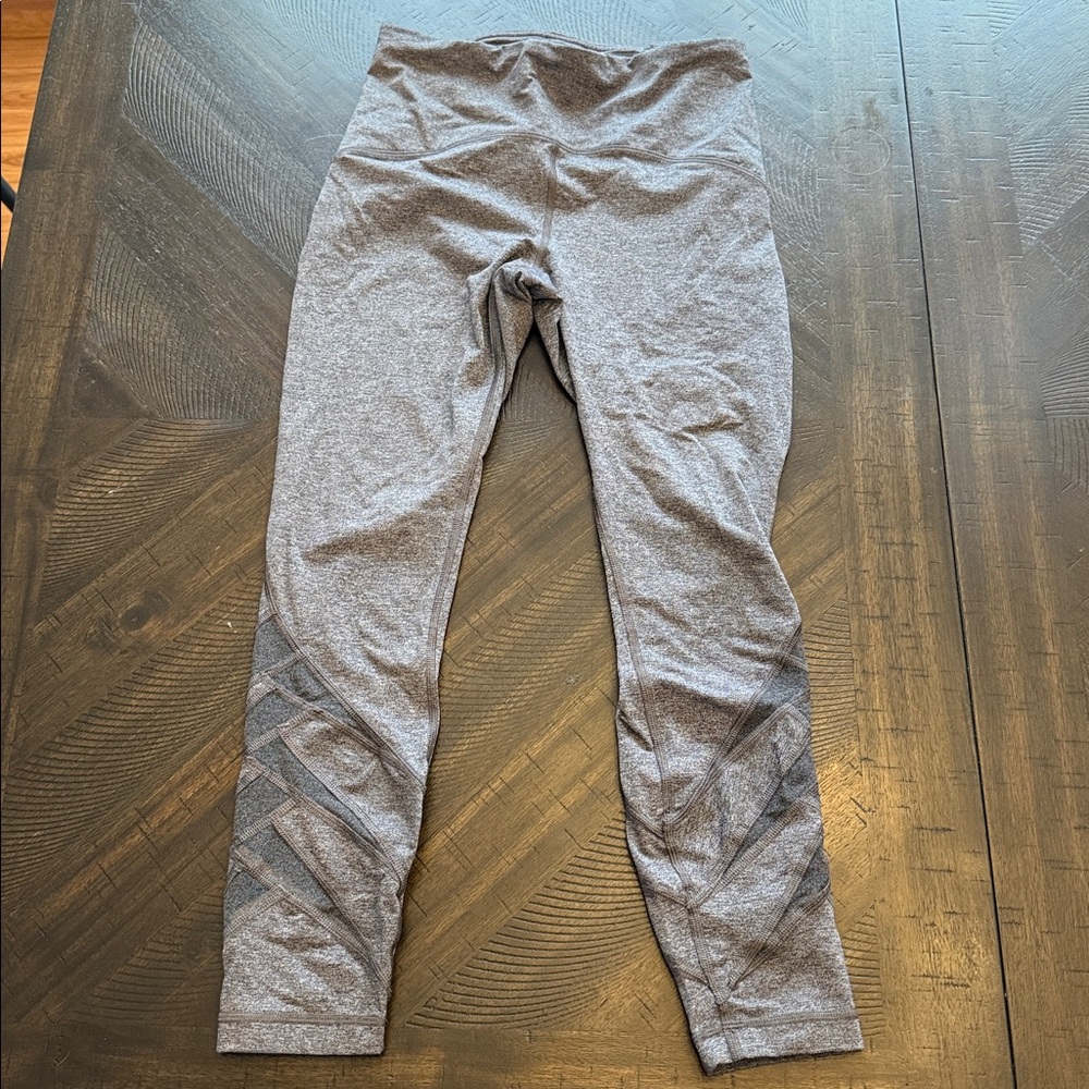 Lululemon 25” Grey Leggings with mesh detail & zipper pocket - Size 8
